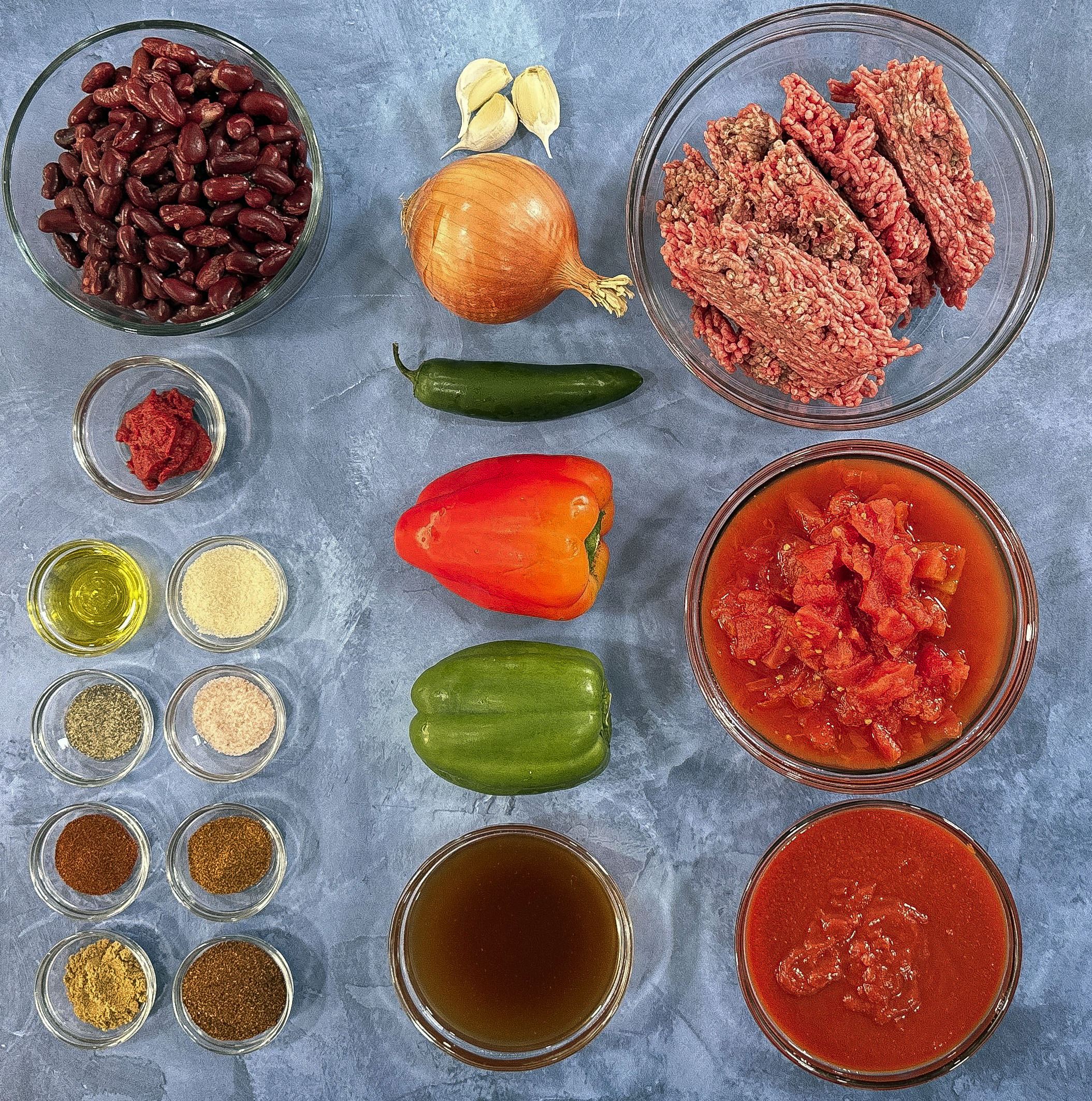 This Classic Chili Recipe is thick, hearty, and full of bold flavors! It's the perfect comfort food for any night, made with ground beef, kidney beans, jalapeños, and a rich tomato base. Easy to make, freezer-friendly, and even better the next day!