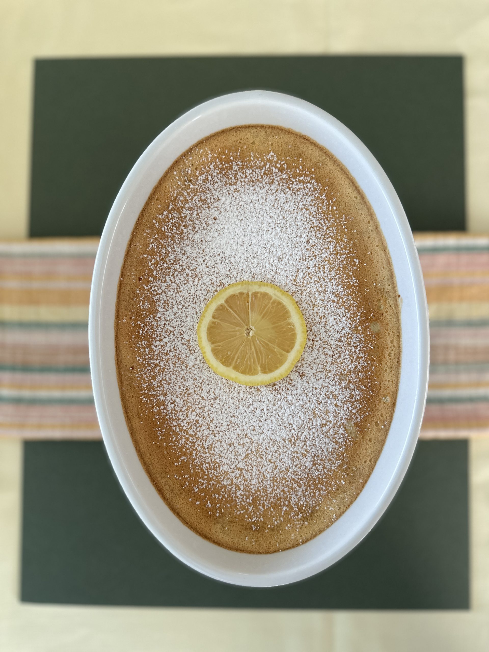 Baking dish containing baked lemon pudding